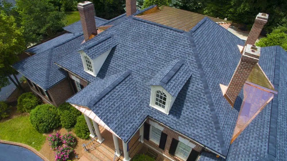 Slide of Guy Roofing