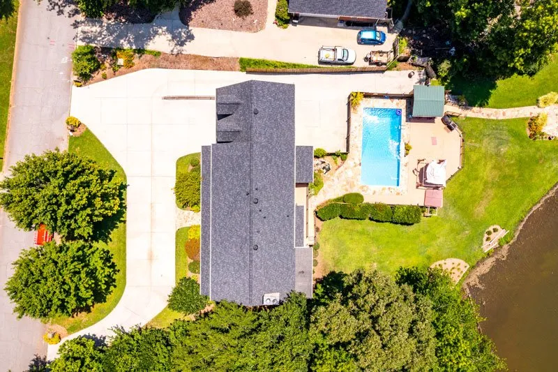 Slide of Guy Roofing