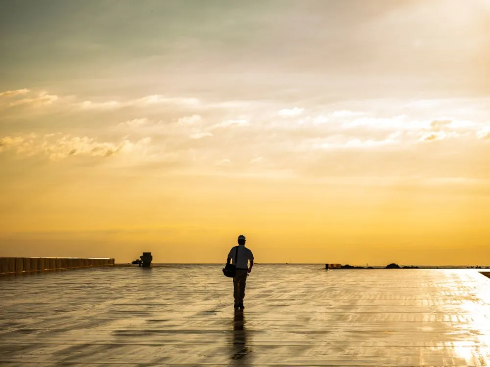 Slide of Guy Roofing