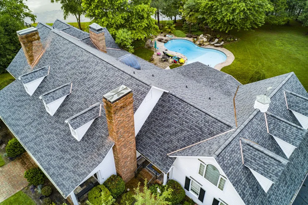 Slide of Guy Roofing