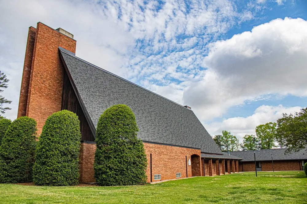 Slide of Guy Roofing