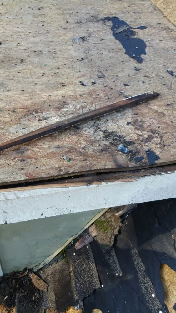 Slide of Guyton Roofing