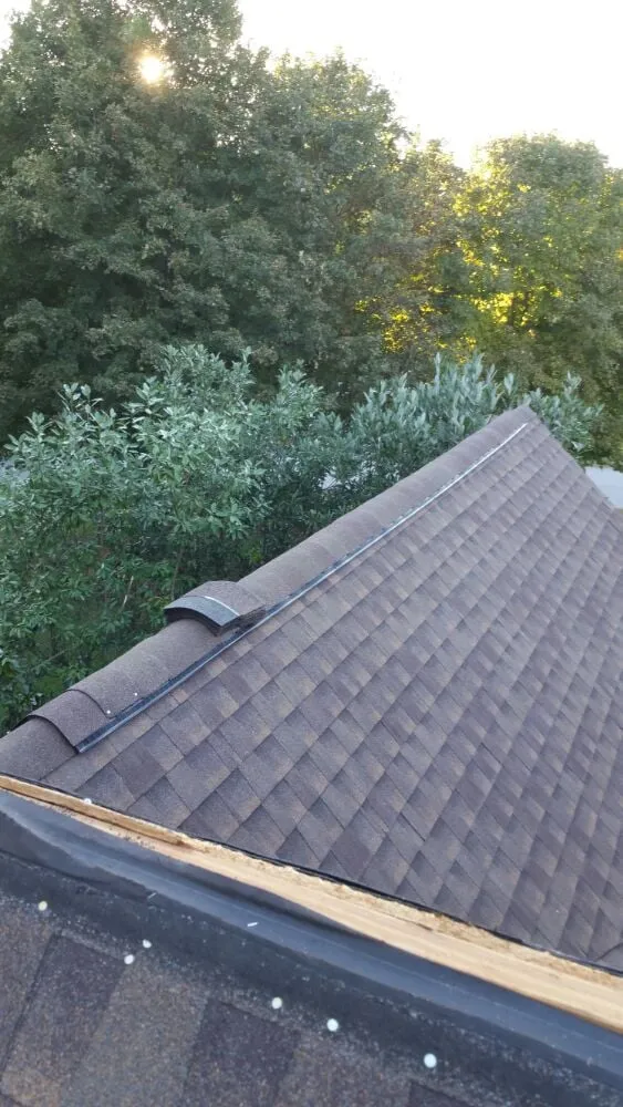 Slide of Guyton Roofing