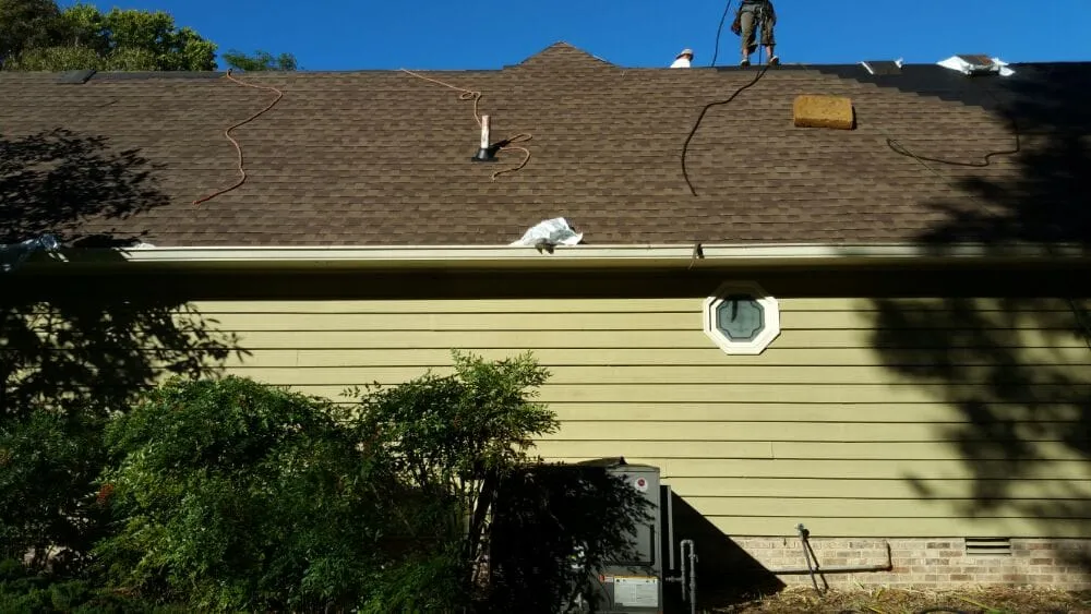 Slide of Guyton Roofing