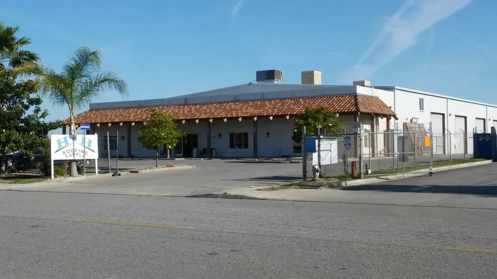 Slide of H & H Roofing Supply