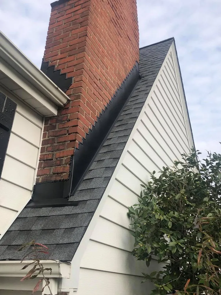 Slide of H & L Roofers