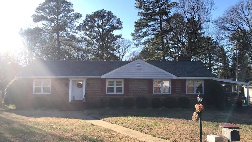 Slide of H & L Roofers