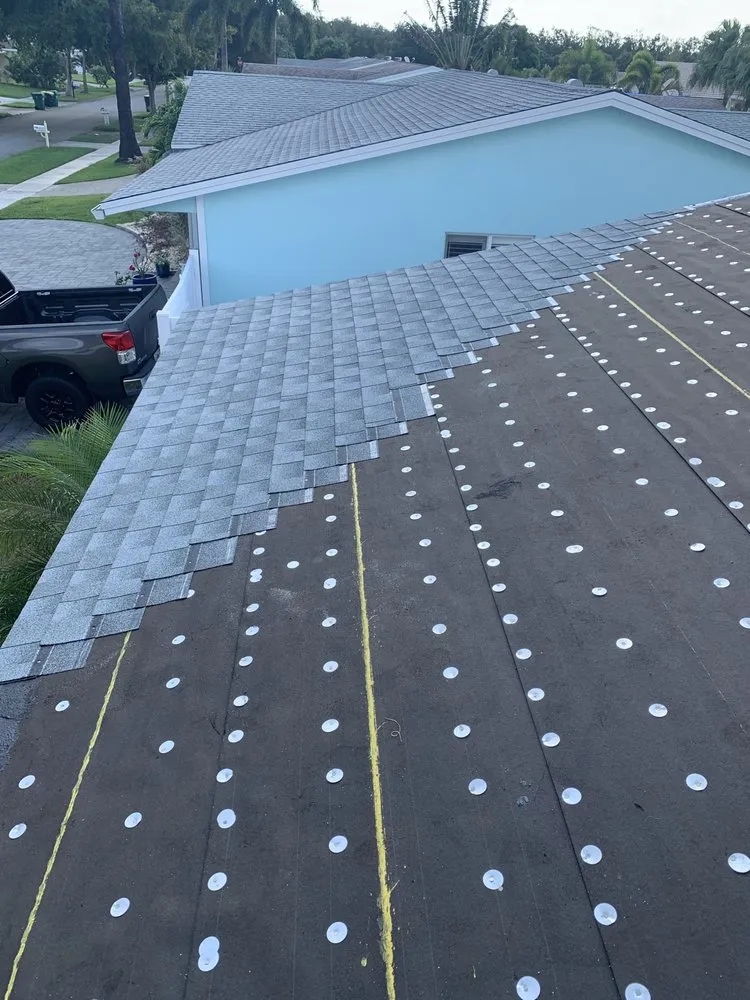 Slide of H American Roofing