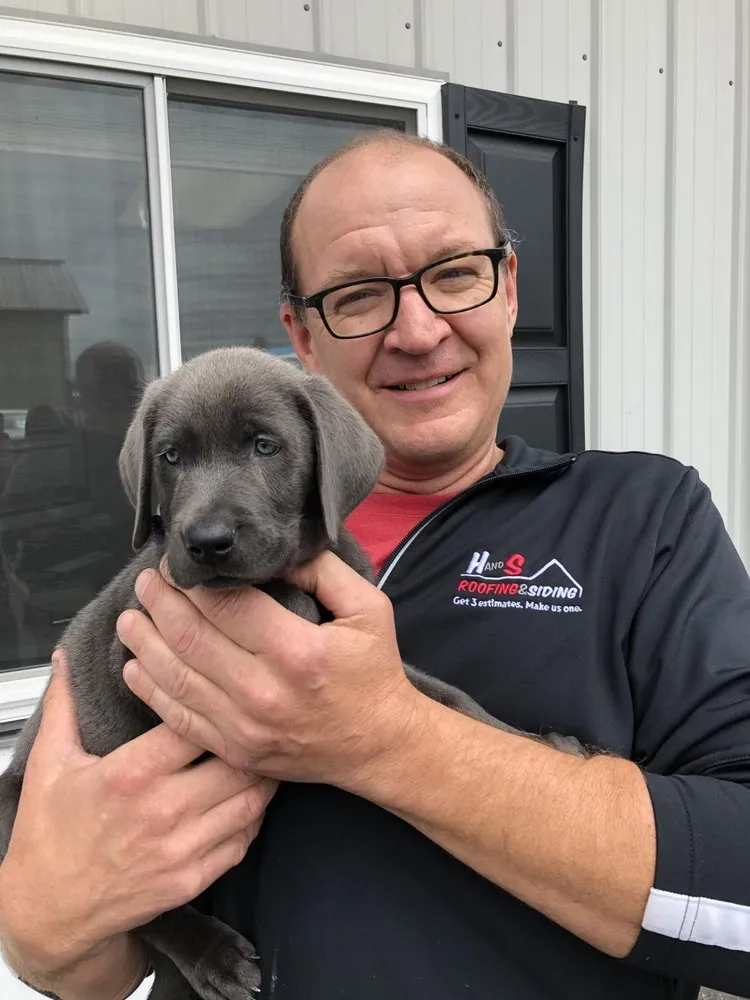 Slide of H and S Roofing