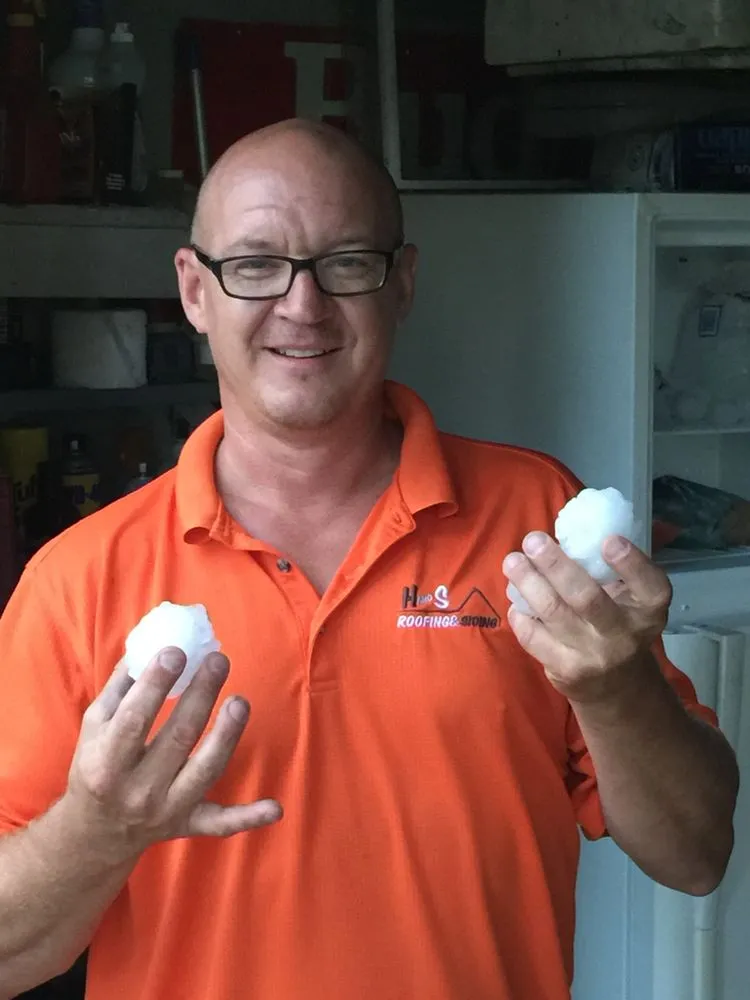 Slide of H and S Roofing