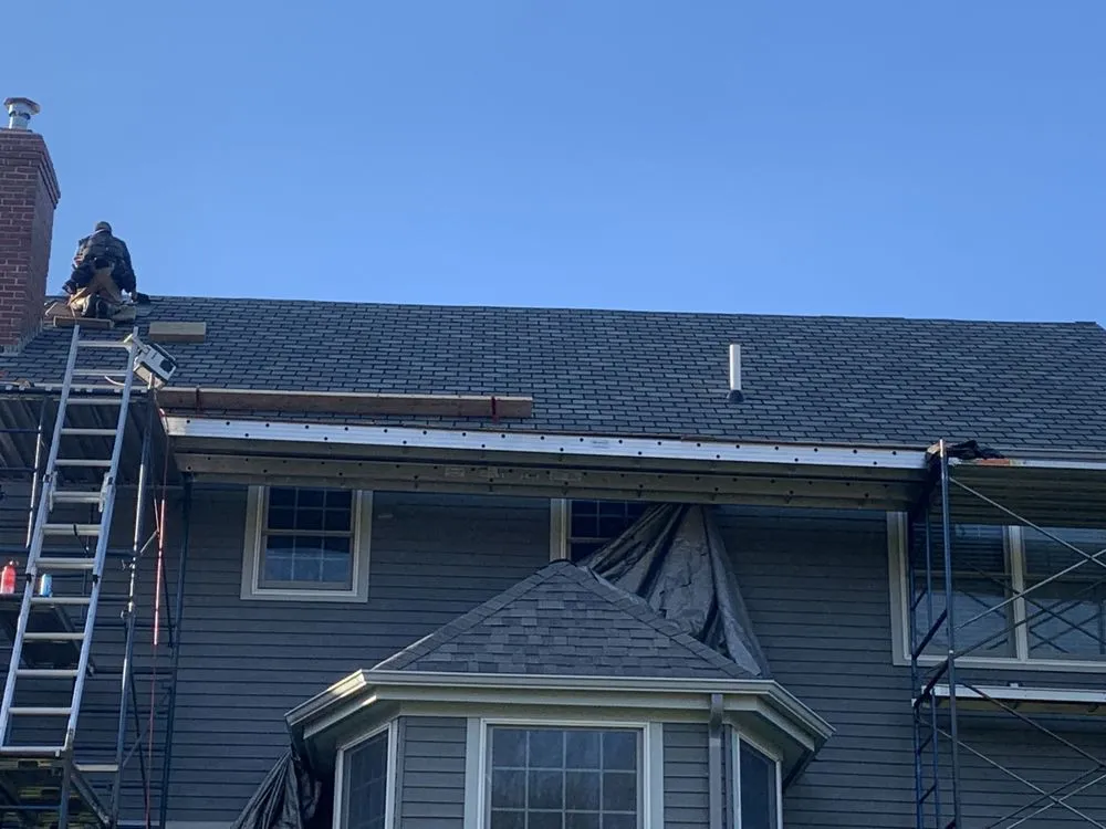 Slide of H R Roofing Repair
