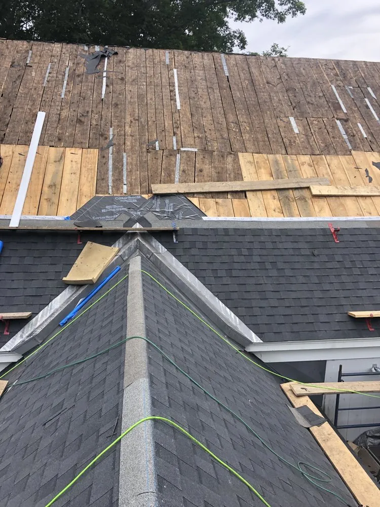 Slide of H R Roofing Repair