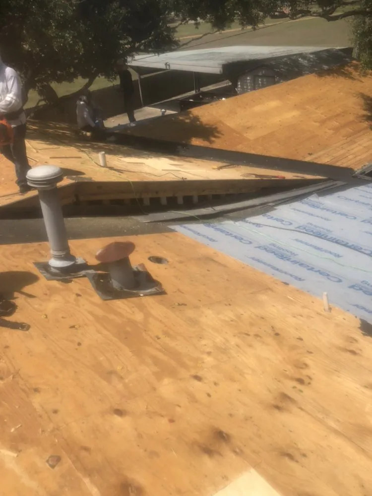 Slide of H Turbo Roofing Specialist