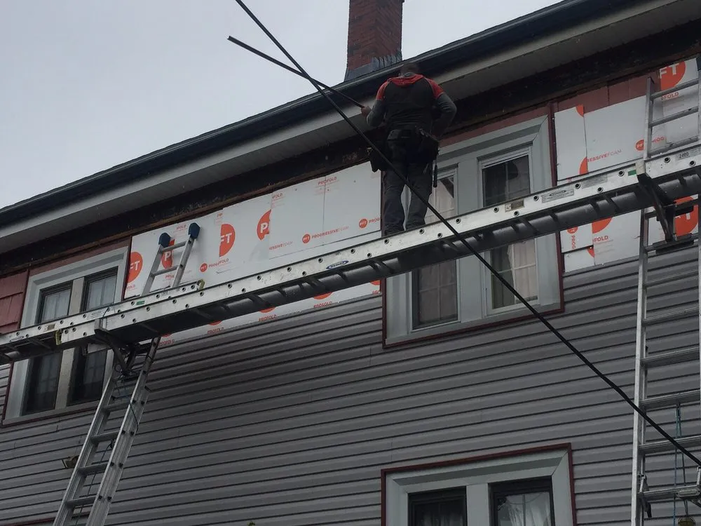 Slide of H V Roofing