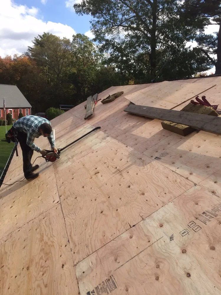 Slide of H V Roofing