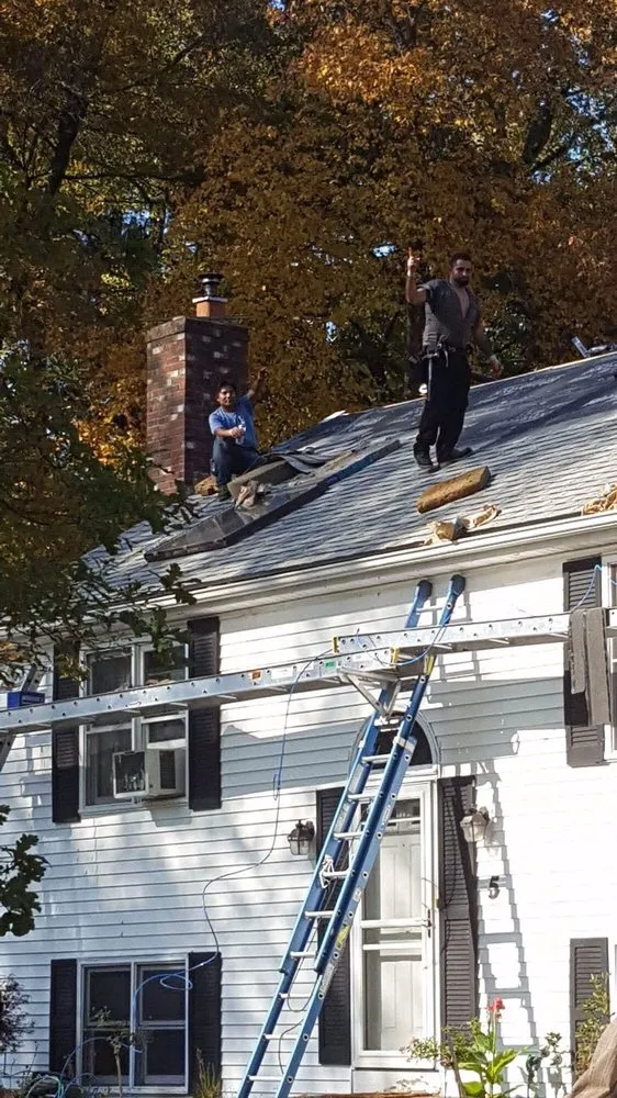 Slide of H V Roofing