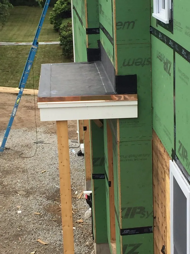 Slide of H V Roofing