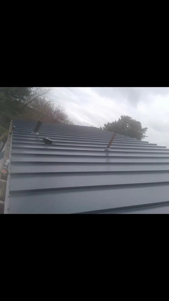 Slide of H V Roofing