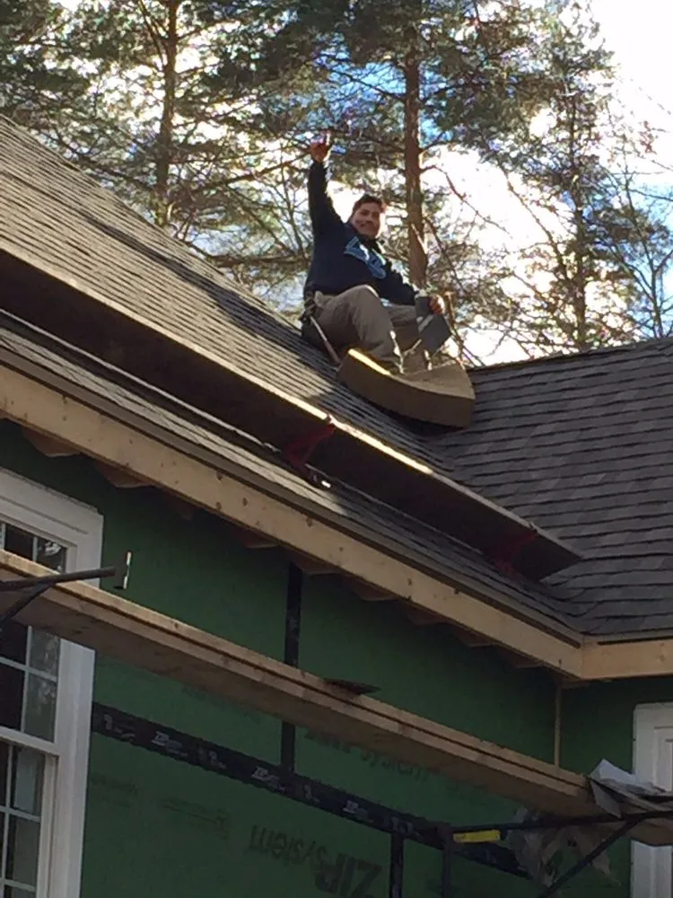 Slide of H V Roofing