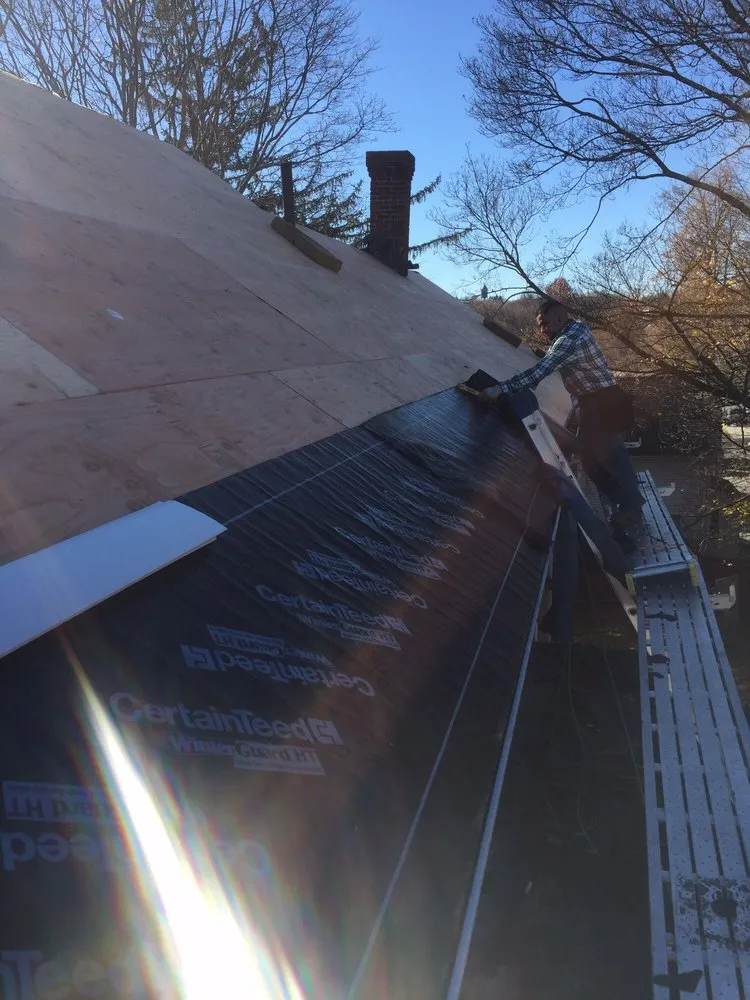 Slide of H V Roofing