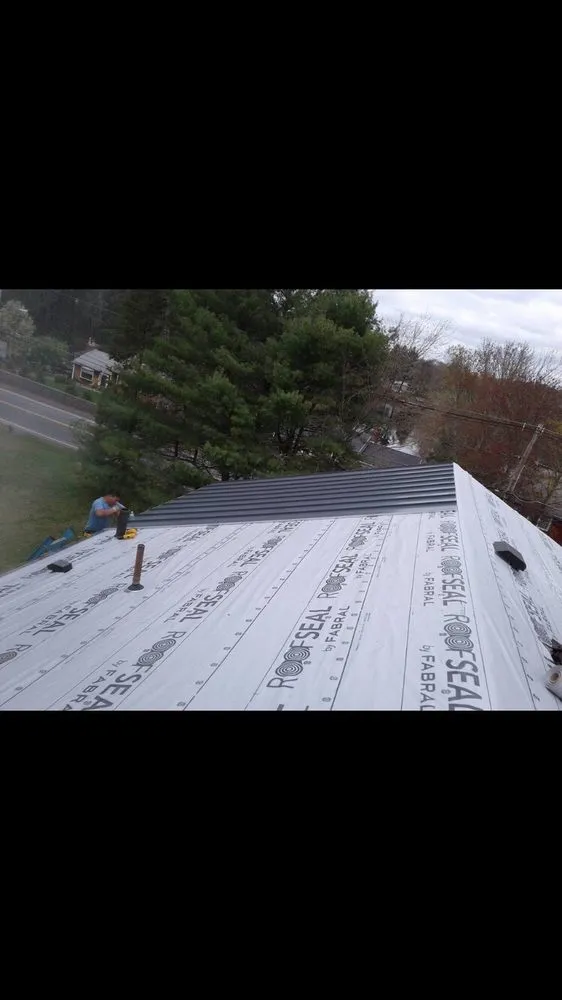 Slide of H V Roofing