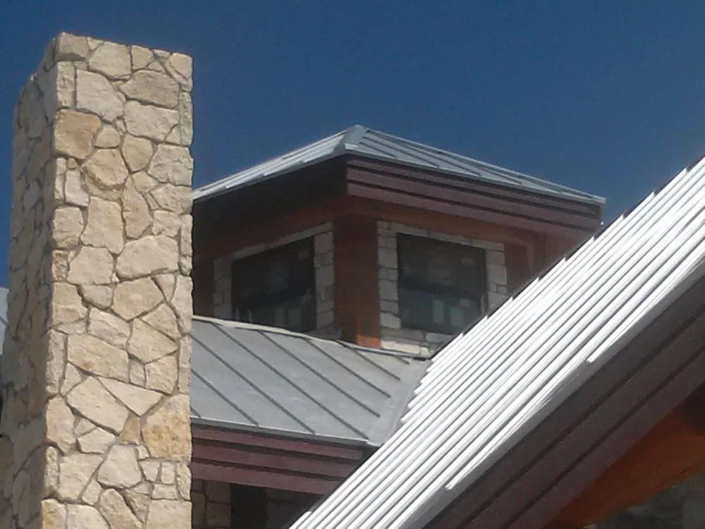 Slide of Hackett's Custom Siding and Metal Roofs