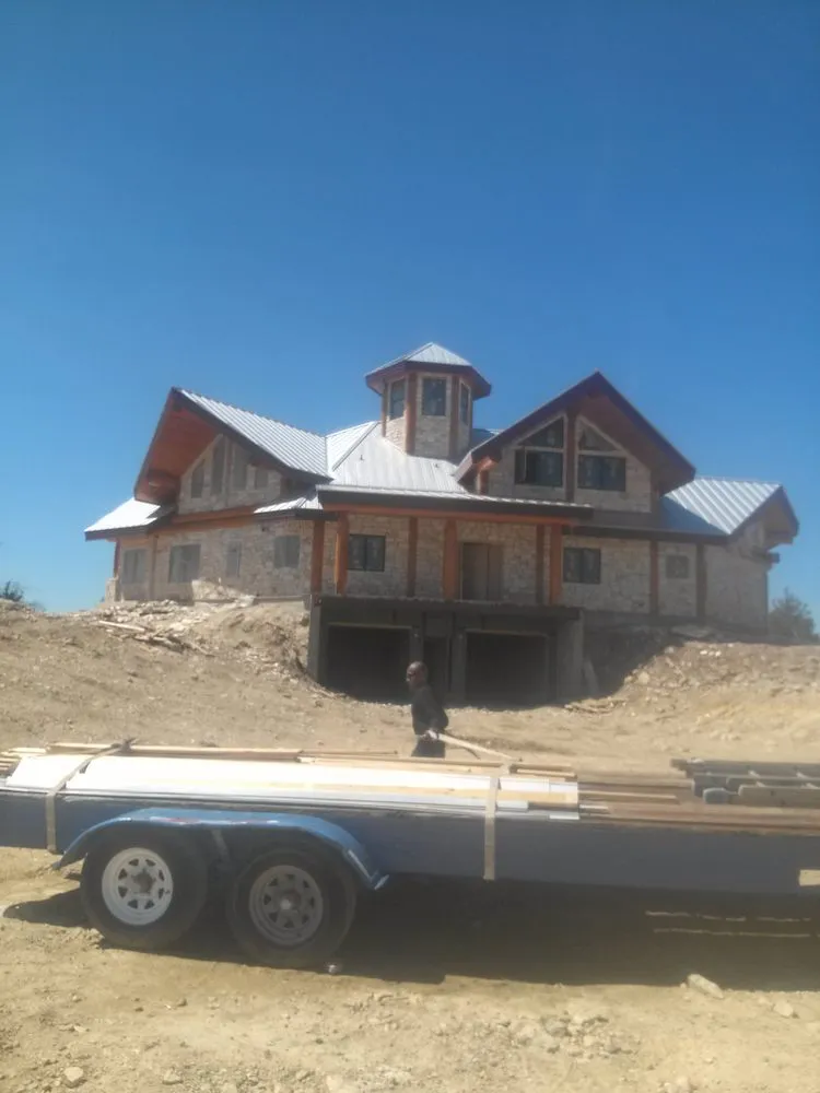 Slide of Hackett's Custom Siding and Metal Roofs