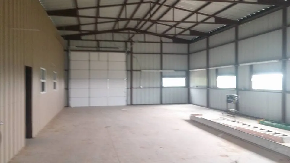 Slide of Hackett's Custom Siding and Metal Roofs