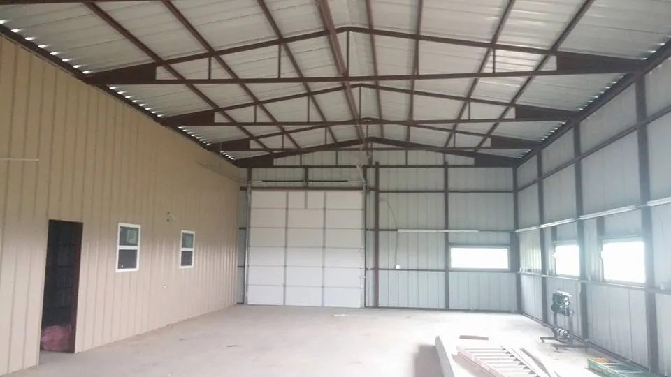 Slide of Hackett's Custom Siding and Metal Roofs