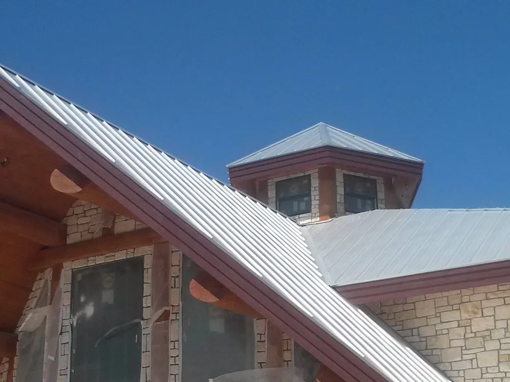 Slide of Hackett's Custom Siding and Metal Roofs