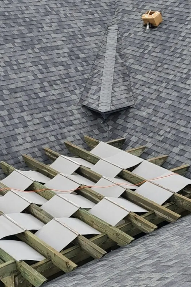 Slide of Hallco Roofing