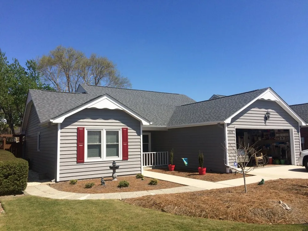 Slide of Hallman Roofing