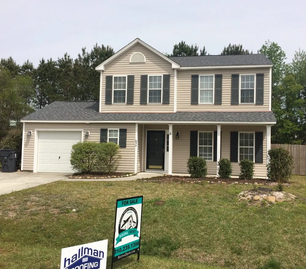 Slide of Hallman Roofing