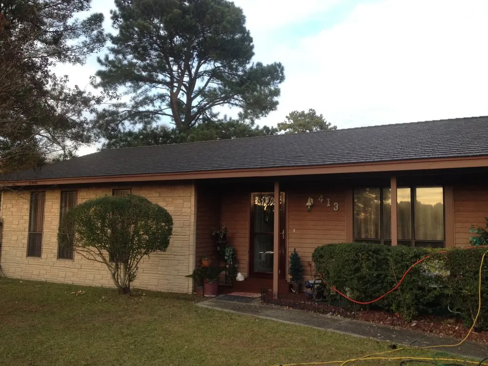 Slide of Hallman Roofing