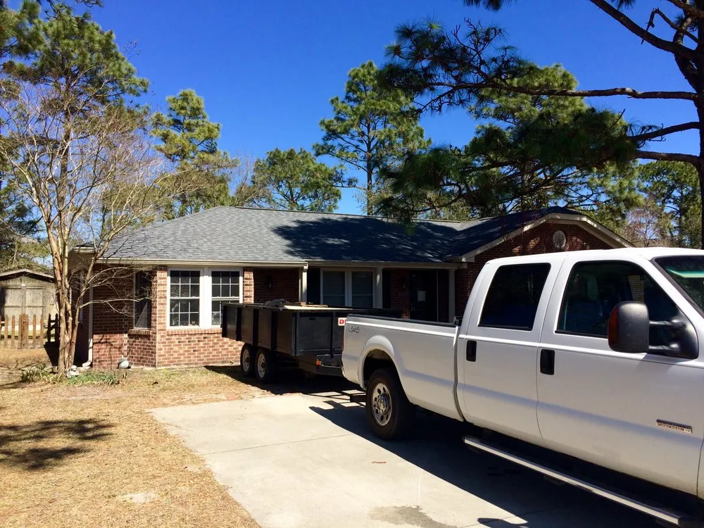 Slide of Hallman Roofing