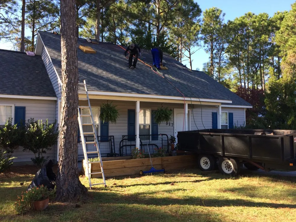 Slide of Hallman Roofing