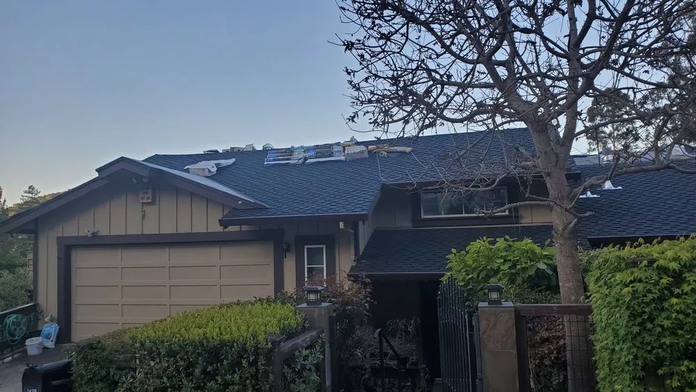 Slide of Hallmark Roofing