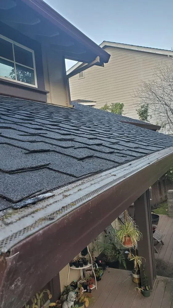 Slide of Hallmark Roofing