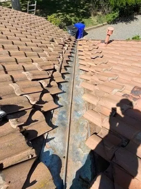 Slide of Hamilton Roofing