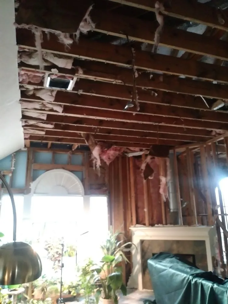 Slide of Hamma Roof & Construction