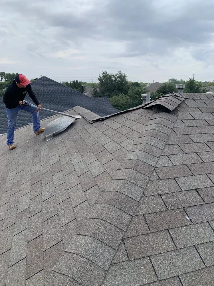 Slide of Hammerhead Roofing and Construction