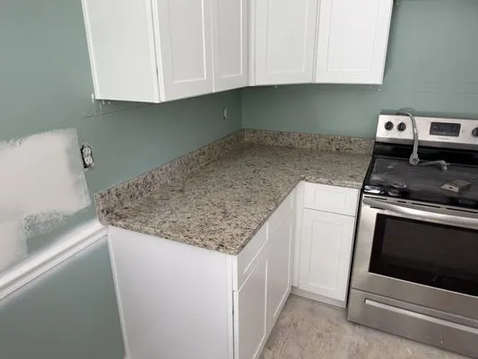 Hammerhead Roofing and Renovations Logo