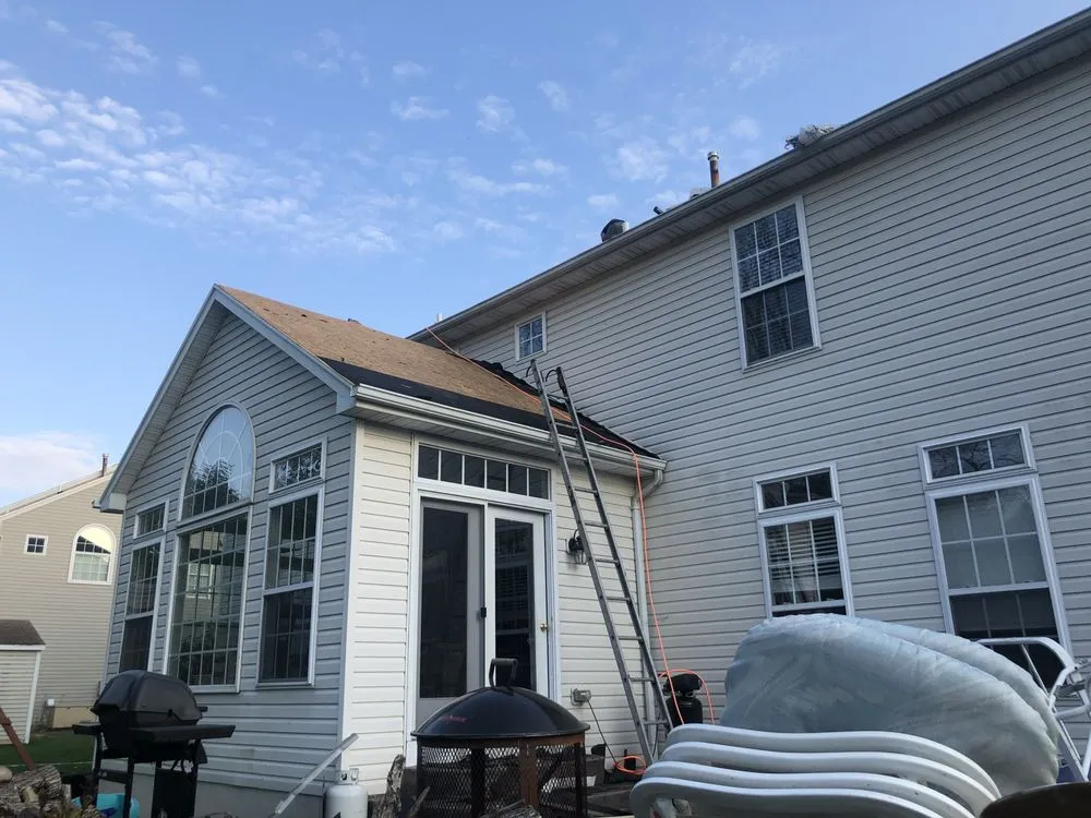 Local residential roofing service for homes in Rapid River, MI by HammerTime Contracting