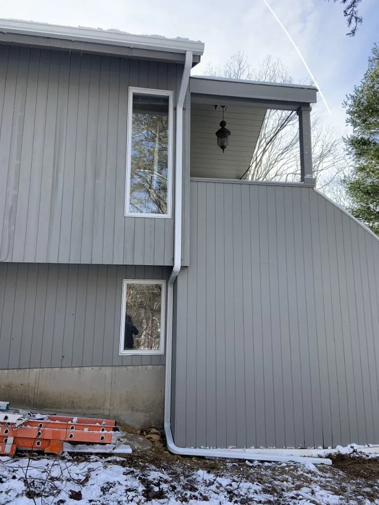 Slide of Hamptons Gutters Corp