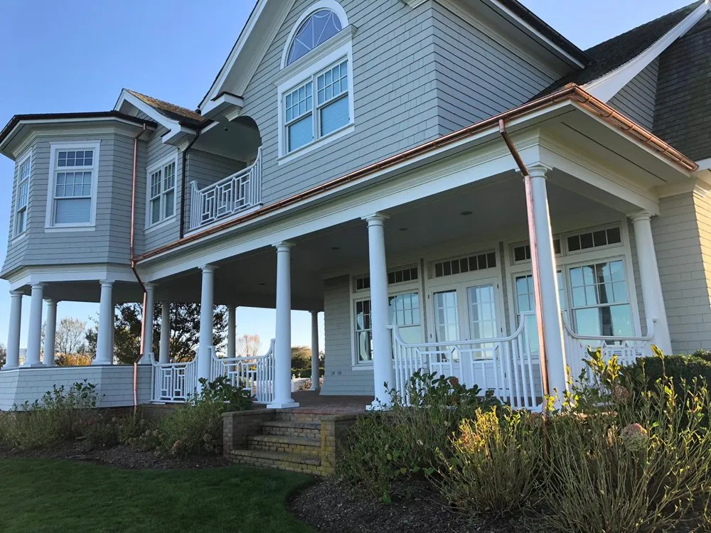 Slide of Hamptons Gutters Corp