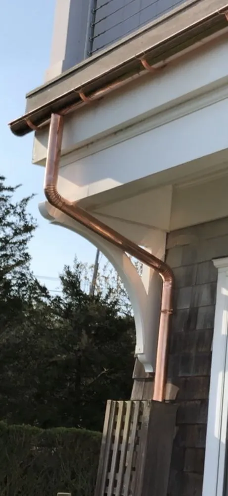 Slide of Hamptons Gutters Corp