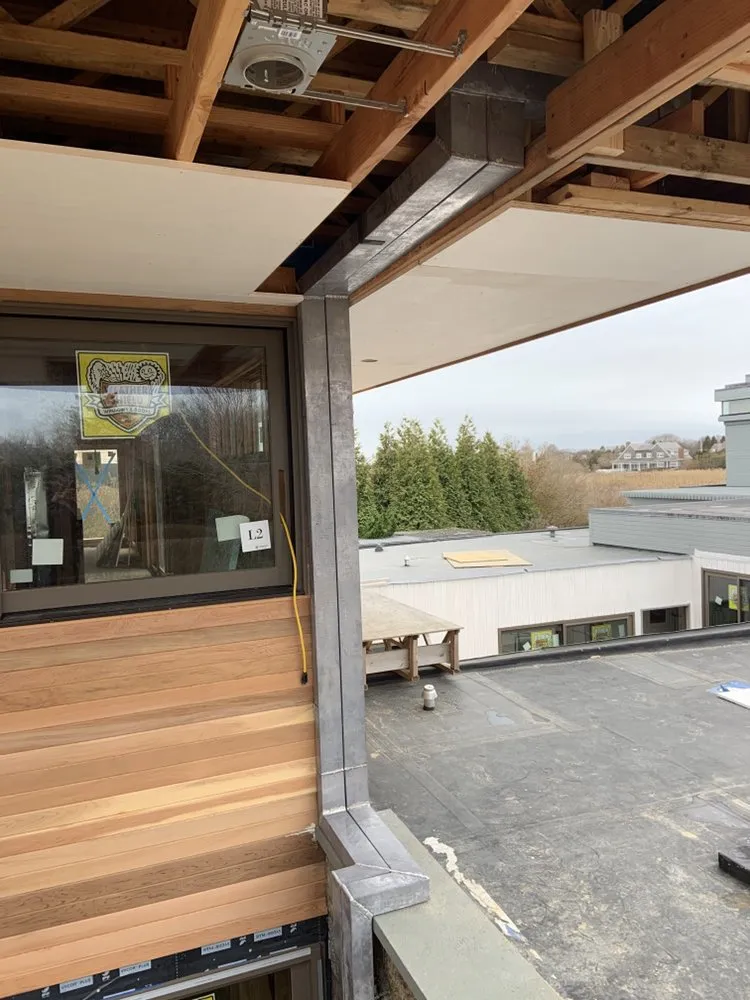 Slide of Hamptons Gutters Corp