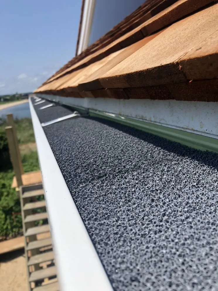 Slide of Hamptons Gutters Corp