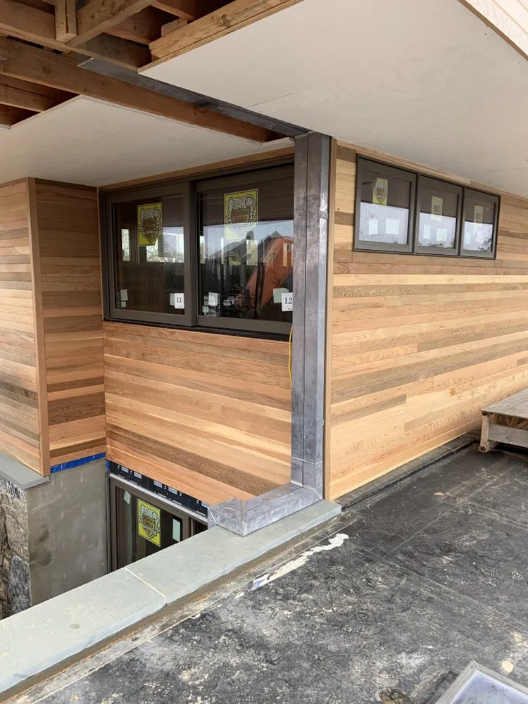 Slide of Hamptons Gutters Corp