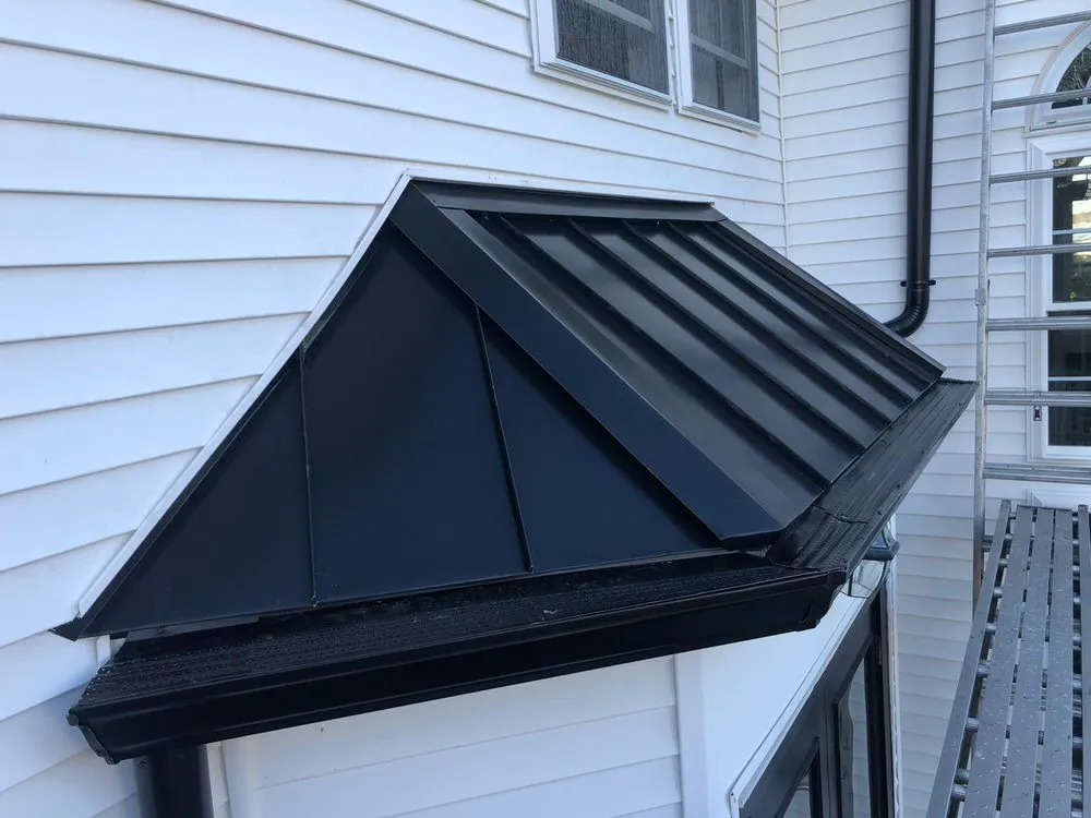 Slide of Hamptons Gutters Corp